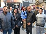 Chief minister Sukhvinder Singh Sukhu meet tourists while strolling at Mall Road, Shimla on Sunday. (Deepak Sansta/ HT)