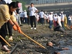 Delhi chief minister Rekha Gupta participates in a cleanliness drive along the Yamuna river at Chhath Ghat near ITO in New Delhi, India, on Sunday (Hindustan Times/Arvind Yadav)