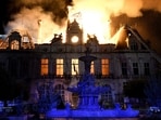 This photograph shows a fire burning and destroying the city hall after a group of individuals forced entry into the building during ongoing protest action against the "high cost of living", in Limoges, central France on October 17, 2026. (Photo by PASCAL LACHENAUD / AFP)