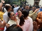 Relatives mourn as they arrive to collect the bodies of victims from a morgue after a stampede during a Durga Puja festival in Kolkata.