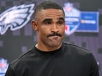 Philadelphia Eagles quarterback Jalen Hurts (1) attends a press conference after an NFL football game against Jacksonville Jaguars in London, Sunday, Oct. 11, 2026. (AP Photo/Alastair Grant)