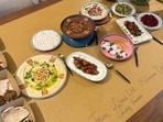 Hosts Ria Kumbhat and Siddharth Gandhi at After Hours cafe with their Middle Eastern spread. (Pics: After Hours and Sanya Panwar)