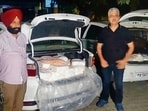 Officials of the heath department with the seized paneer in Ludhiana on Sunday. (HT Photo)