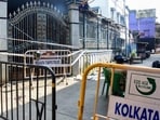Security tightens outside the quadrant of the Chorbagan Durga Puja pandal stampede site, which claimed the lives of at least 19 people, in Kolkata on Monday. (Utpal sarkar)