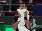 Serbia's Novak Djokovic during a break in play on his round of 64 match against Poland's Hubert Hurkacz