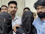 Two of the three suspects, who were arrested for firing on actor Tiger Shroff’s car at Juhu, Mumbai, on Sunday evening. They were presented during a press conference by superintendent of police (SP) Tejaswini Gautam in Kota on Monday hours after their arrest. (PTI Photo)