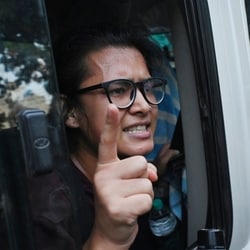 All India Students' Association (AISA) National President Neha Bora being detained during a protest near Mandi House demanding the resignation of Chief Election Commissioner Gyanesh Kumar, in New Delhi on Friday.