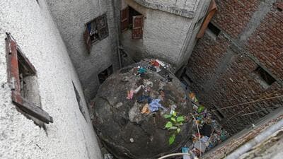 A Lodhi-era tomb at Zamrudpur, being used as a waste dumping spot, surrounded by encroachments, as on May 6 this year. (Sanchit Khanna/HT Photo) A Lodhi-era tomb at Zamrudpur, being used as a waste dumping spot, surrounded by encroachments, as on May 6 this year. (Sanchit Khanna/HT Photo)