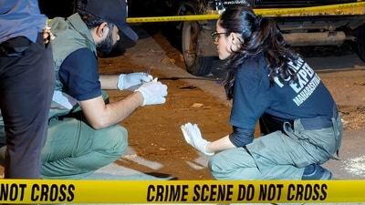 Forensic officials conduct investigation at the crime scene where gunmen opened fire at Bollywood actor Tiger Shroff, near Pushpa Park under Juhu police station, in Mumbai, Maharashtra, Sunday, Oct. 18, 2026. (PTI) Forensic officials conduct investigation at the crime scene where gunmen opened fire at Bollywood actor Tiger Shroff, near Pushpa Park under Juhu police station, in Mumbai, Maharashtra, Sunday, Oct. 18, 2026. (PTI)