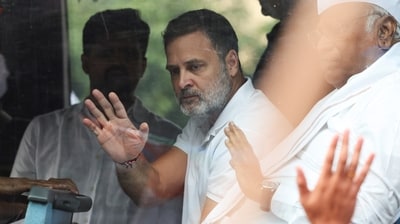 Congress leader and leader of opposition in Lok Sabha Rahul Gandhi waves to supporters as opposition parties march to the Supreme Court to protest a controversial revision of voter lists that has sparked days of unrest, in New Delhi, India, October 12, 2026