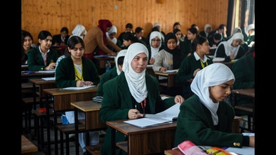 Students appear for the Class 10th State Board Examination at Government Girls Higher Secondary School, in Srinagar on Monday. (ANI) Students appear for the Class 10th State Board Examination at Government Girls Higher Secondary School, in Srinagar on Monday. (ANI)