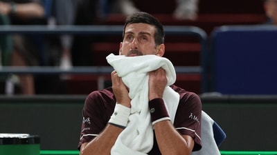 Serbia's Novak Djokovic during a break in play on his round of 64 match against Poland's Hubert Hurkacz (REUTERS)
