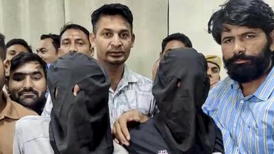 Two of the three suspects, who were arrested for firing on actor Tiger Shroff’s car at Juhu, Mumbai, on Sunday evening. They were presented during a press conference by superintendent of police (SP) Tejaswini Gautam in Kota on Monday hours after their arrest. (PTI Photo)