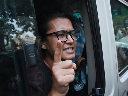All India Students' Association (AISA) National President Neha Bora being detained during a protest near Mandi House demanding the resignation of Chief Election Commissioner Gyanesh Kumar, in New Delhi on Friday.