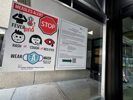 A measles alert sign hangs outside the entrance to the Cohen Children's Medical Center in New Hyde Park, New York in March 2025. (Representational)