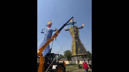 At the Ramlila ground in Greater Noida’s Site 4, the Shri Ramlila Committee has erected three towering effigies. (HT Photo)