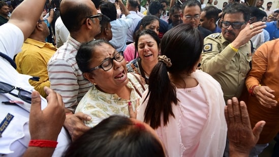 Relatives mourn as they arrive to collect the bodies of victims from a morgue after a stampede during a Durga Puja festival in Kolkata. (Reuters)