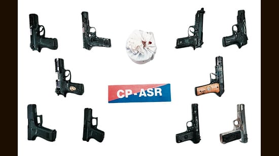 The consignment of arms and drugs recovered from the three accused. (HT)
