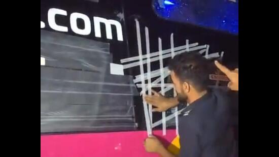 The windowpane of a bus being fixed after a stone struck it near Doraha in Ludhinaa district on Sunday night.