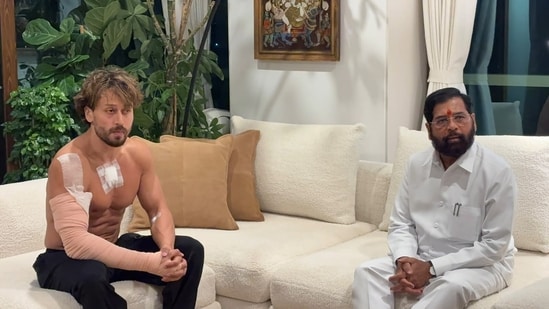 Maharashtra Deputy Chief Minister Eknath Shinde, right, during a meeting with Bollywood actor Tiger Shroff after unidentified assailants allegedly attacked the actor's vehicle.