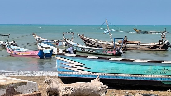 A man sits on a fishing boat in Mocha on October 17, 2026. The Saudi-led coalition fighting the Houthis has launched hundreds of raids in Yemen backing the internationally recognised government since the start of the renewed fighting in the long-running civil war. The conflict, dormant for years, erupted again in July and intensified after the Houthis seized the country's Red Sea coast last month.