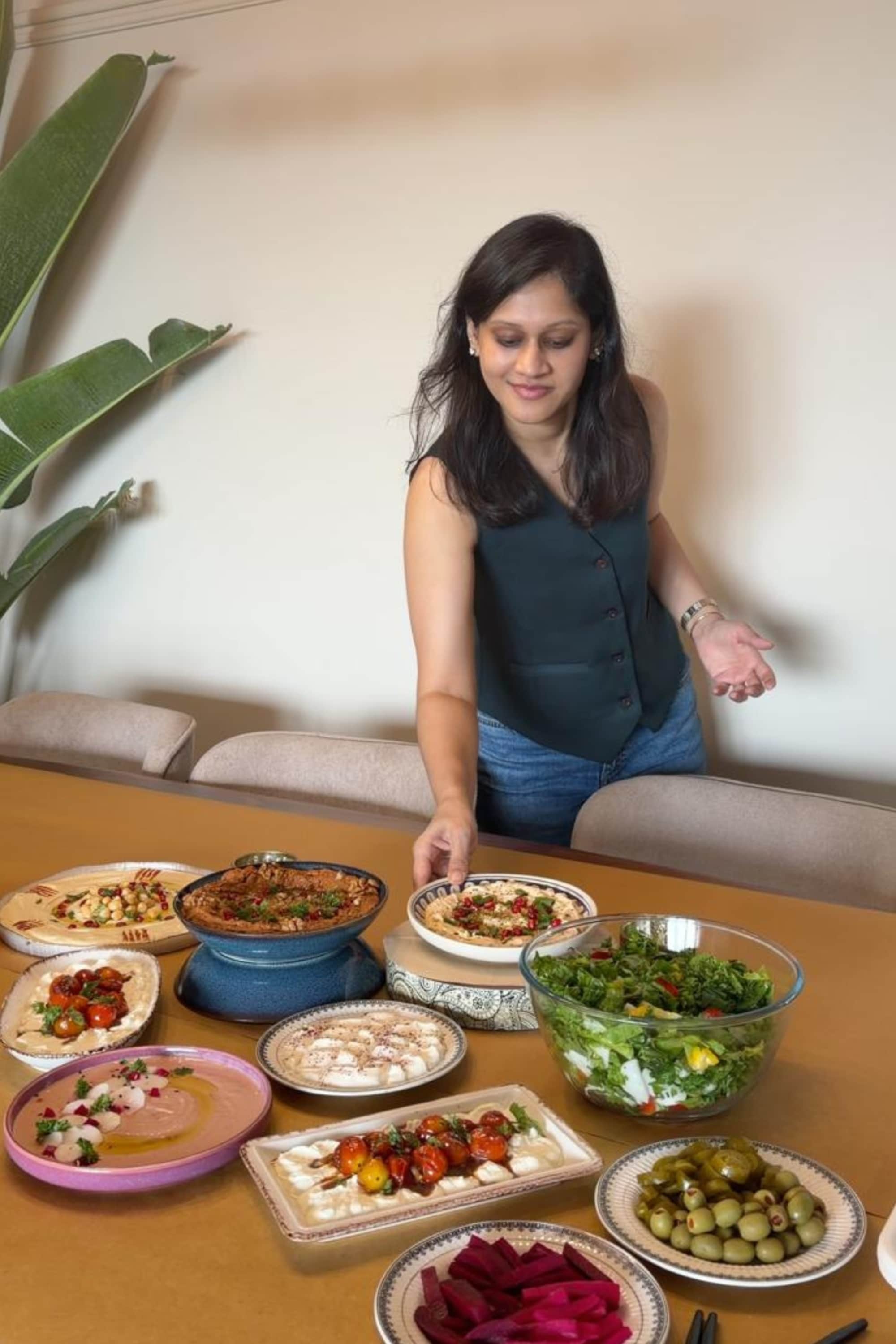 Host Ria with the Middle Eastern spread at After Hours.