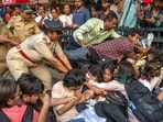 CJP activists are detained by Mumbai Police at Kotwal Garden in Dadar after staging a protest in mumbai.