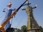 At the Ramlila ground in Greater Noida’s Site 4, the Shri Ramlila Committee has erected three towering effigies. (HT Photo)