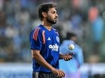 India's Bhuvneshwar Kumar warms up before the start of the fifth T20 international cricket match between India and West Indies at the M Chinnaswamy Stadium in Bengaluru on October 17, 2026