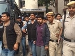 Gangster Lawrence Bishnoi is escorted by police personnel before being produced in Panchkula Court, Haryana, India, on Wednesday, Nov. 13, 2019. (HT Archive)