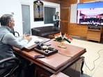 Himachal Pradesh chief minister Sukhvinder Singh Sukhu addresses the anti-chitta walkathon organised in the Shahpur assembly constituency via video conferencing, in Shimla on Monday. (@SukhuSukhvinder X)