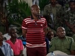 Self-proclaimed pastor Paul Mackenzie stands during their court appearance with his co-accused at the Mombasa Law Courts in Mombasa