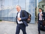 John Overdeck leaves court in New Jersey.