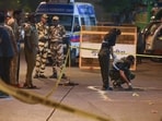A forensic team collects samples from the spot where shots were fired at actor Tiger Shroff, in Mumbai on Sunday. (Photo for representation)