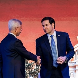 US Secretary of State Marco Rubio (R) shakes hands with India's Foreign Minister Subrahmanyam Jaishankar during the Freedom 250 reception at the Jio World Convention Centre in Mumbai on October 20, 2026.