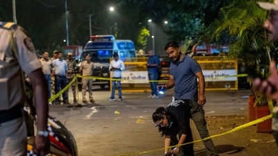Forensic Experts and Police collect samples of evidence from the spot where unidentified assailants fired at Tiger Shroff, near Pushpa Narsee park, Vile Parle west in mumbai, India, on, October 18, 2026. Forensic Experts and Police collect samples of evidence from the spot where unidentified assailants fired at Tiger Shroff, near Pushpa Narsee park, Vile Parle west in mumbai, India, on, October 18, 2026.