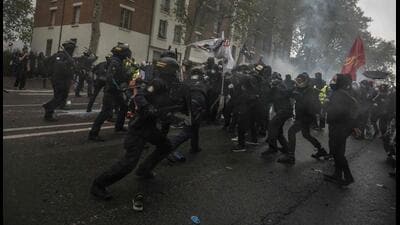 Protesters are facing the most heavily weaponised crowd-control arsenals in Europe. (AFP) Protesters are facing the most heavily weaponised crowd-control arsenals in Europe. (AFP)