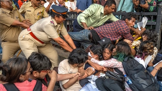 CJP activists are detained by Mumbai Police at Kotwal Garden in Dadar after staging a protest in mumbai. (Hindustan Times)
