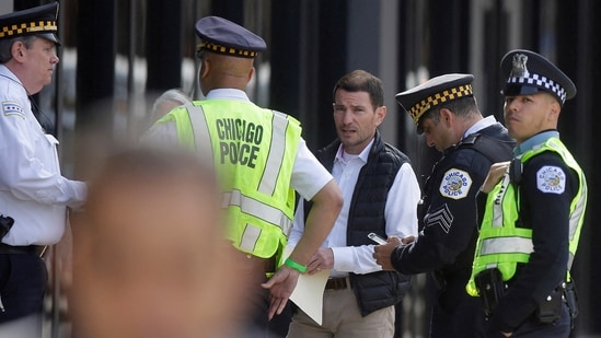 Authorities are investigating the deaths of five people found in multiple rooms of a Mundelein home. All suffered fatal close-range gunshot wounds.