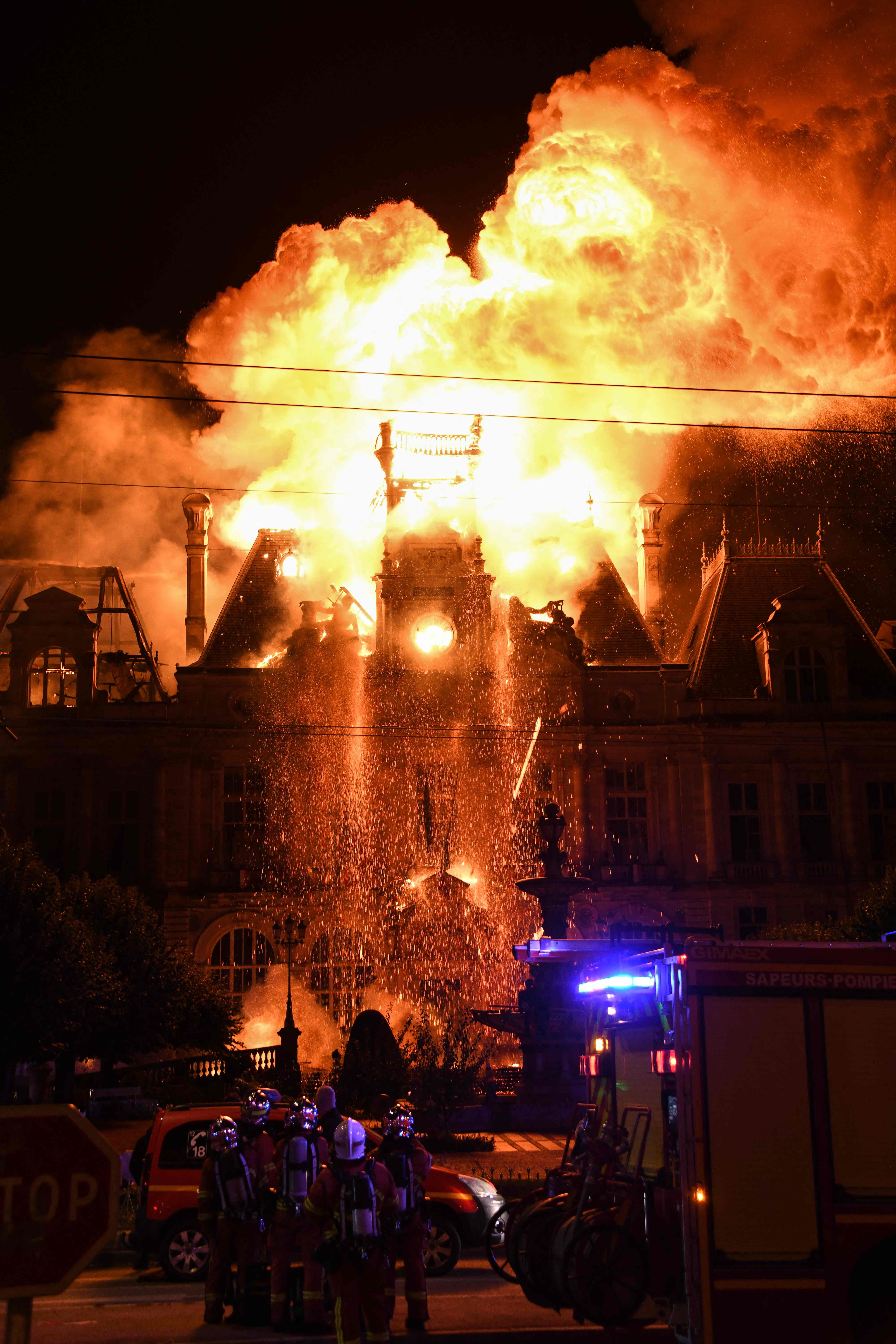 This photograph shows a fire burning and destroying the city hall after a group of individuals forced entry into the building during ongoing protest in Limoges, central France on October 17, 2026. (AFP) This photograph shows a fire burning and destroying the city hall after a group of individuals forced entry into the building during ongoing protest in Limoges, central France on October 17, 2026. (AFP)