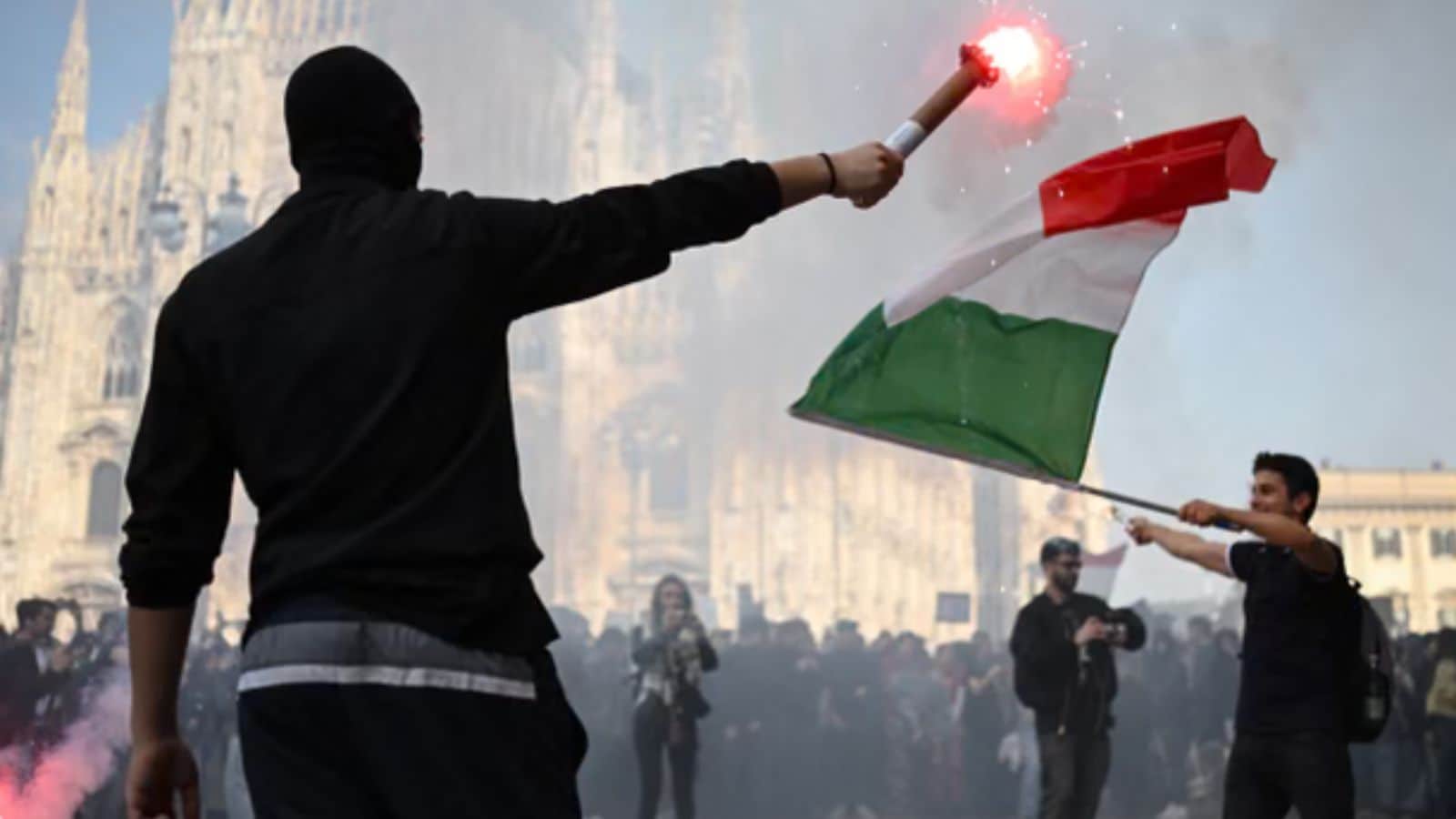 Protesters in Piazza Duomo in Milan on Saturday. (AFP) Protesters in Piazza Duomo in Milan on Saturday. (AFP)