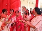 At DLF Club5 in Gurugram, residents from different neighbourhoods gathered for Sindoor Khela, bringing the community’s Durga Puja celebrations to a close. (HT Photo)