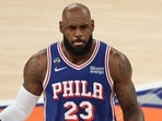 The broadcast caught LeBron James exchanging words with a fan in the stands.