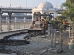 Clean-up operations are underway at the Gomti Riverfront in Lucknow on Wednesday (HT Photo)