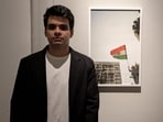 Artist and Photographer Raihan Vadra, son of Congress leader Priyanka Gandhi Vadra, with one of his photographs at Bikaner House. 