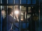 A police vehicle carrying Cockroach Janta Party leaders Saurav Das and Ashutosh Ranka leaves the Mandir Marg police station, in New Delhi, Wednesday, Oct. 21. 
