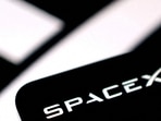 SpaceX stock rises as revenue jumps 161% and Elon Musk considers a possible Tesla merger. (REUTERS/Dado Ruvic/Illustration/File Photo)