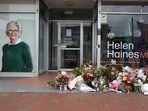 - Floral tributes are placed outside the offices of Australian lawmaker Helen Haines who was critically wounded in a 