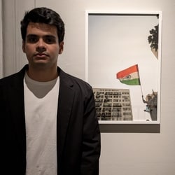 Artist and Photographer Raihan Vadra, son of Congress leader Priyanka Gandhi Vadra, with one of his photographs at Bikaner House. 