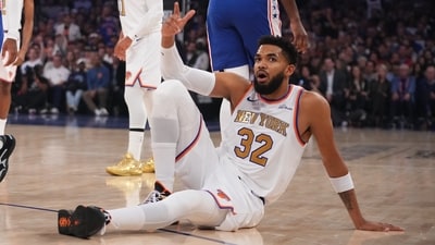 New York Knicks center Karl-Anthony Towns, below, argues a call during the first half of an NBA basketball game against the Philadelphia 76ers. (AP Photo) New York Knicks center Karl-Anthony Towns, below, argues a call during the first half of an NBA basketball game against the Philadelphia 76ers. (AP Photo)